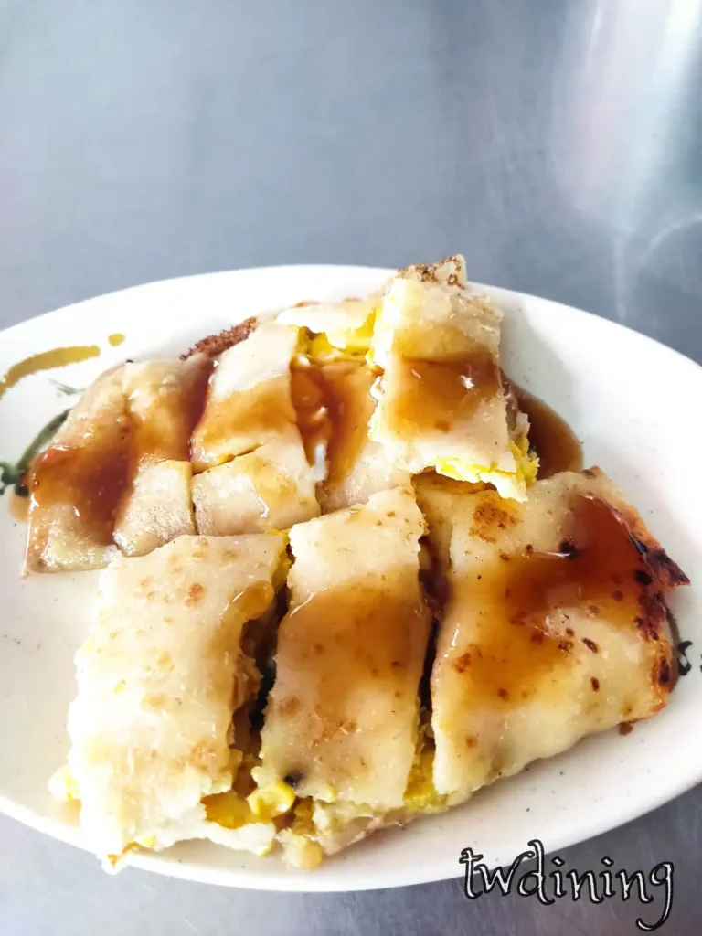 這份 Corn Egg Pancake 玉米蛋餅由 阿婆早餐 供應，Sweet Corn 飽滿顆粒感與 Soft Egg 蛋香穿插交織出極致 Fresh 的營養早晨風味。